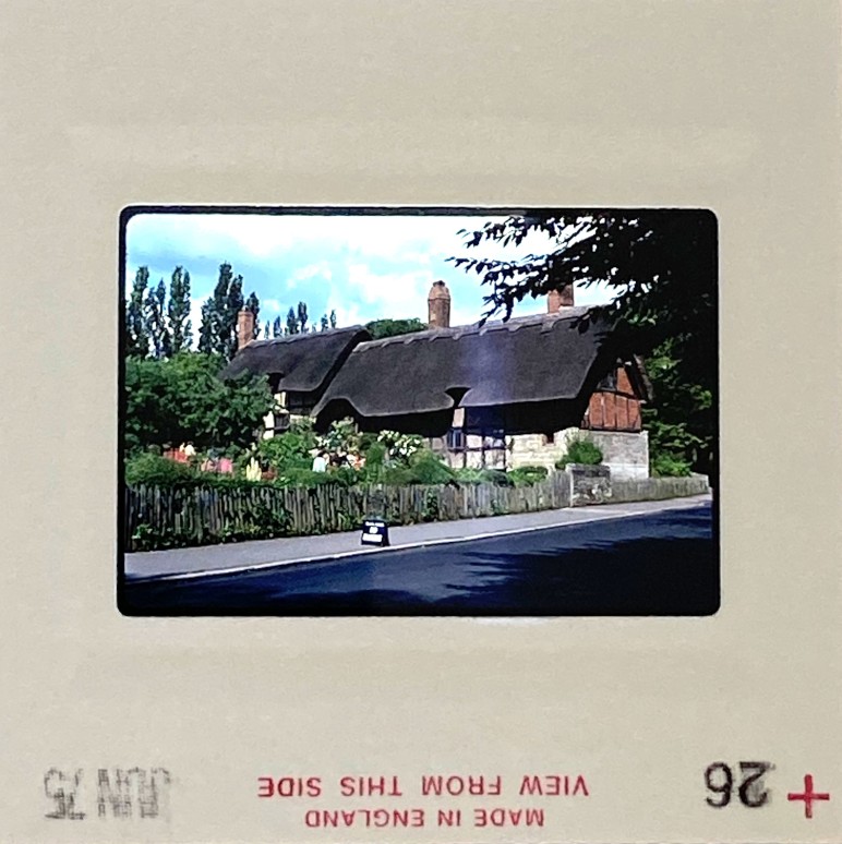 1975 slide of Anne Hathaway’s Cottage in Stratford‑upon‑Avon, UK with loss of detail and minor damage – original image ready for professional slide restoration